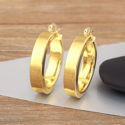 AuraHoop™ Bold Copper Circle Earrings – Four Styles of Effortless Elegance