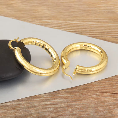 AuraHoop™ Bold Copper Circle Earrings – Four Styles of Effortless Elegance